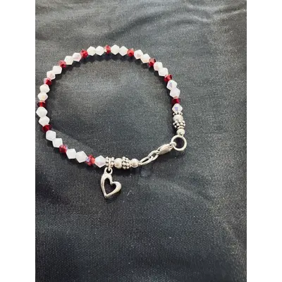 Bracelet, Swarovski crystals sterling silver clasp and charm