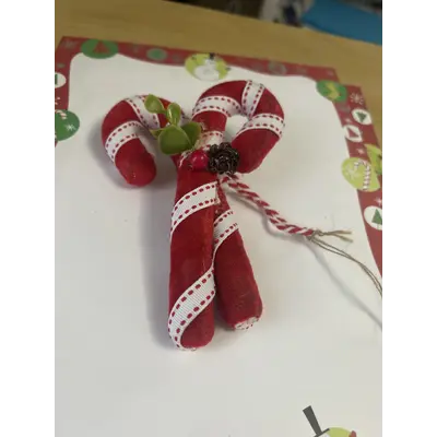 candy cane ornament or gift package topper