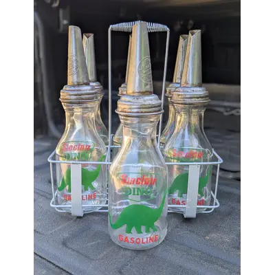 Sinclair Dino oil bottles and rack