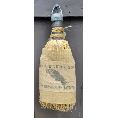 Whisk broom with label