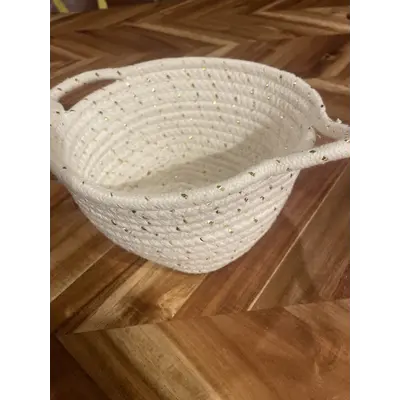 White and gold woven basket