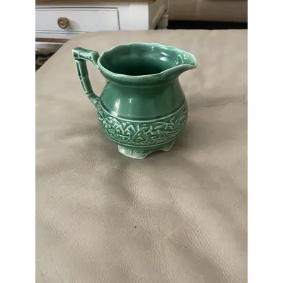 Small green pitcher