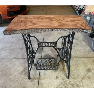 Live Edge Table with Vintage Cast Iron Singer Sewing Machine Base
